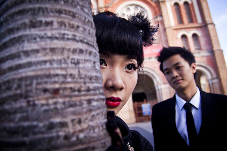 couple notre dame cathedral saigon