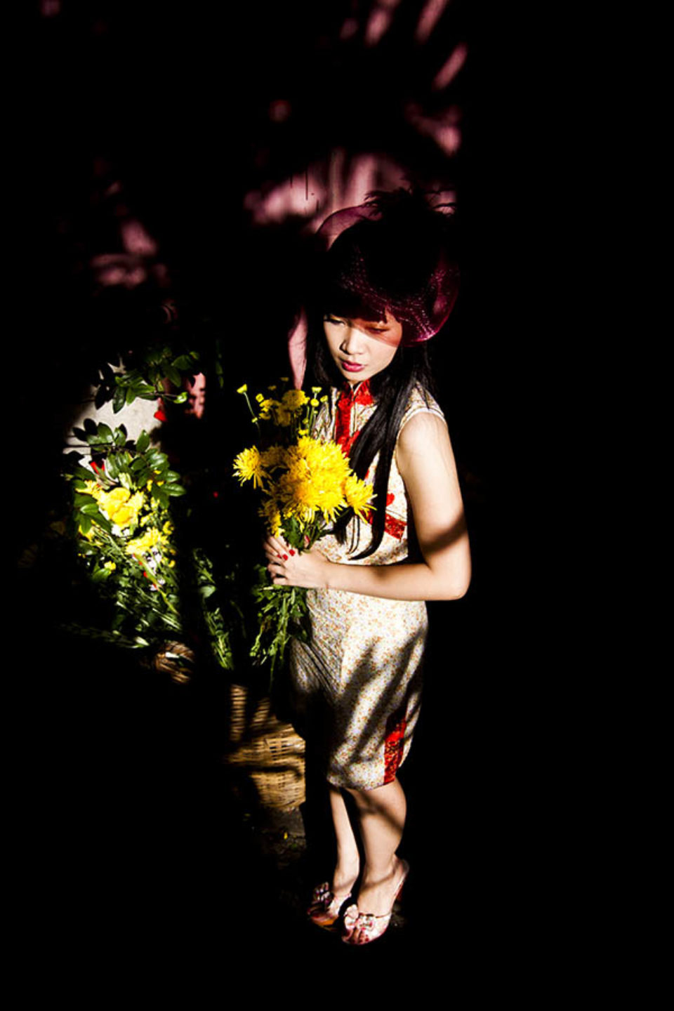 Coupyoung woman in hat in temple sunlight