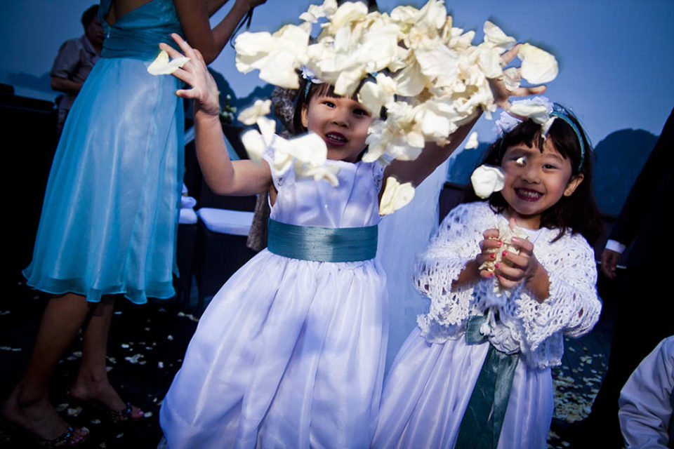Flower girl throwing petals