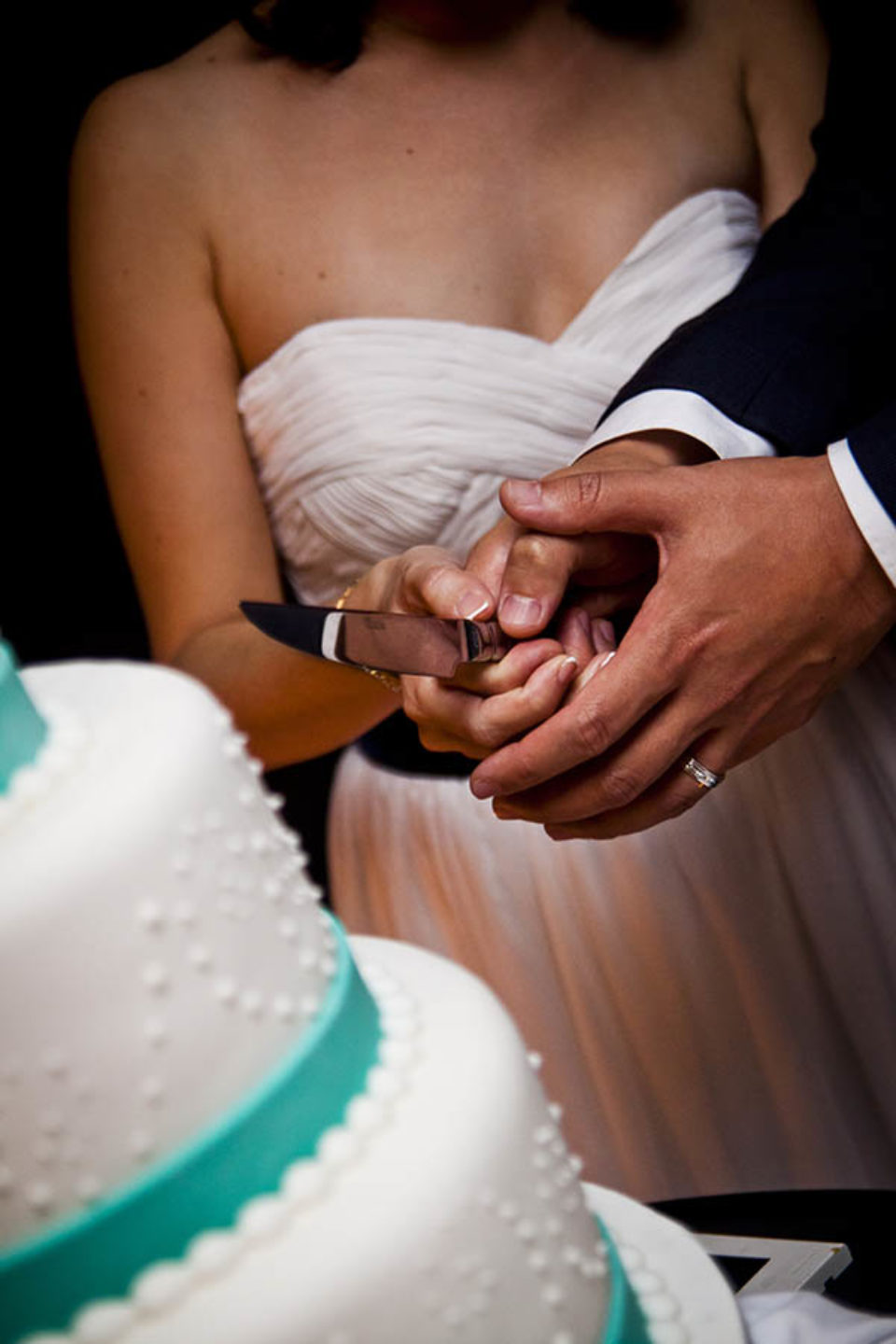 Married couple cut cake
