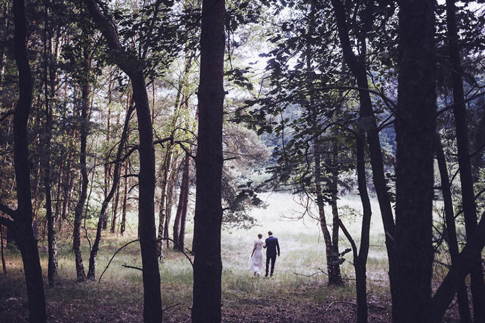 Bride and groom in forest