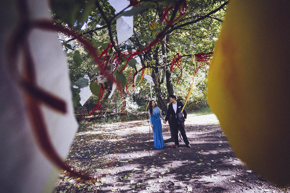 Couple seen through coloured paper