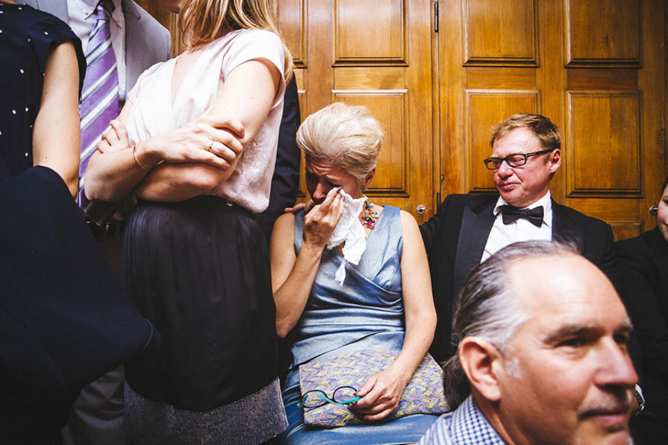 Groom's mother crying during wedding