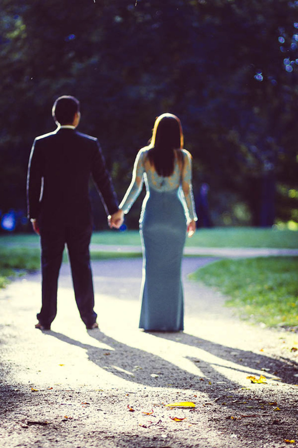 Couple holding hands soft focus