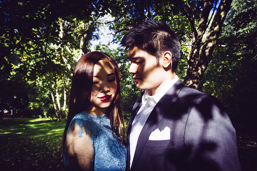 High contrast vibrant portrait of couple in park