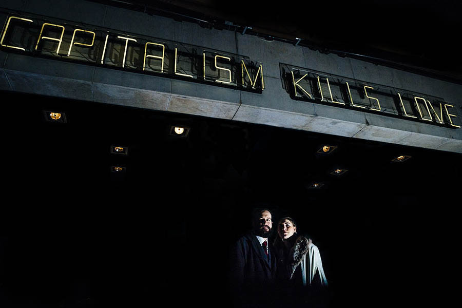 capitalism kills love couple portrait