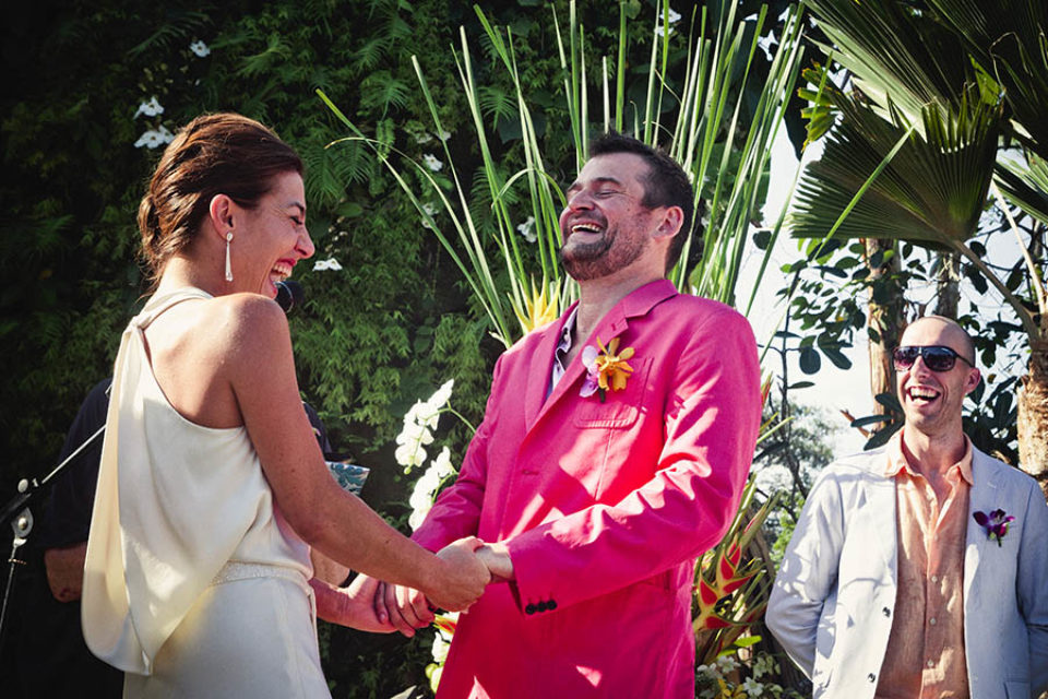 Bali Indonesia Wedding Photographer - Bride and groom laughing during ceremony
