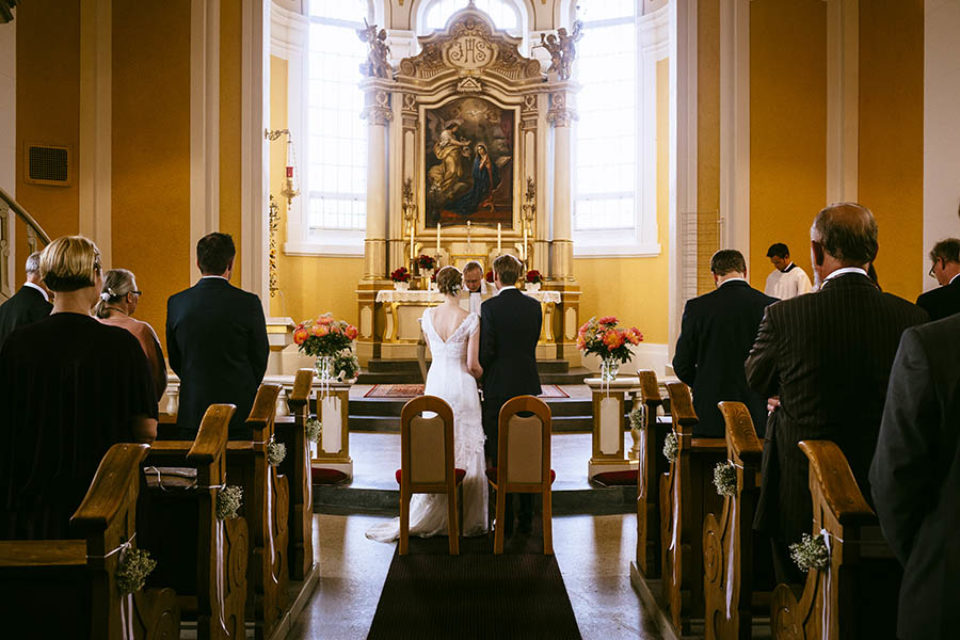 Bride and groom at church altar