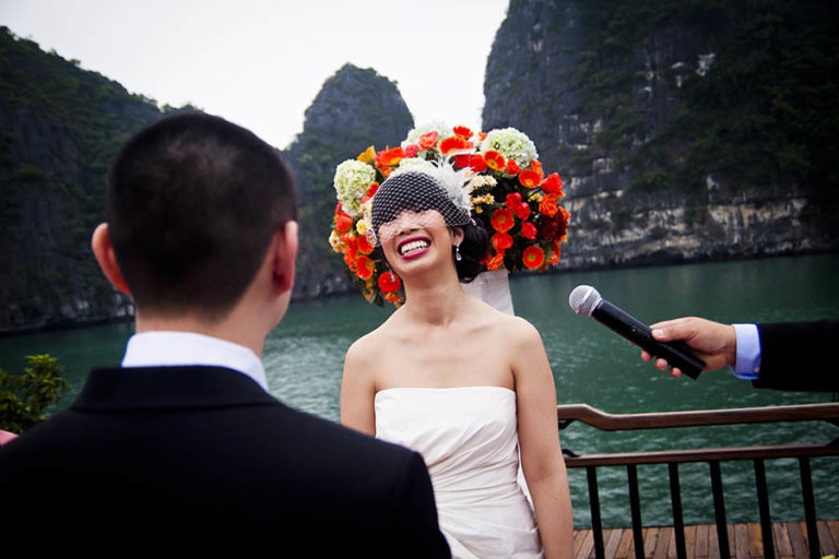 Bride laughing during wedding ceremony