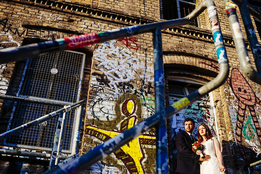 engagement photographer - couple shoot in graffiti covered area