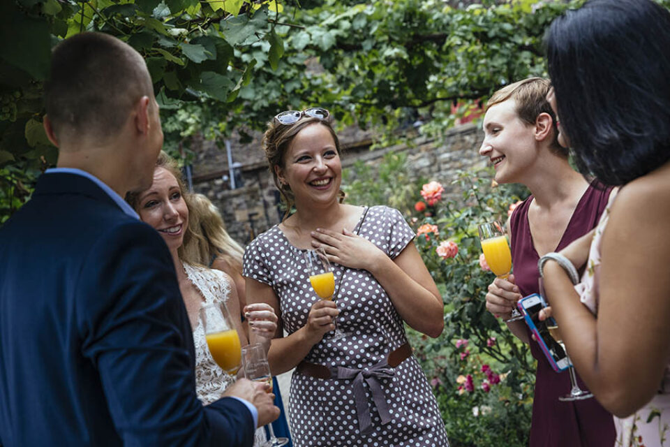 Wedding guests enjoy welcome drink