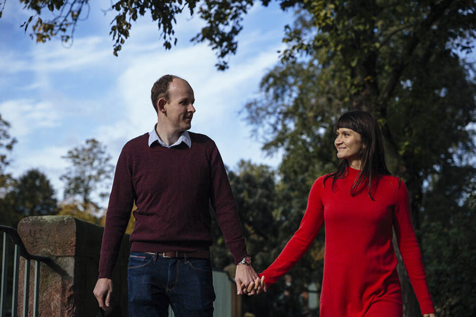 Couple walking holding hands