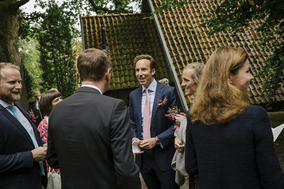 Guests chatting before wedding