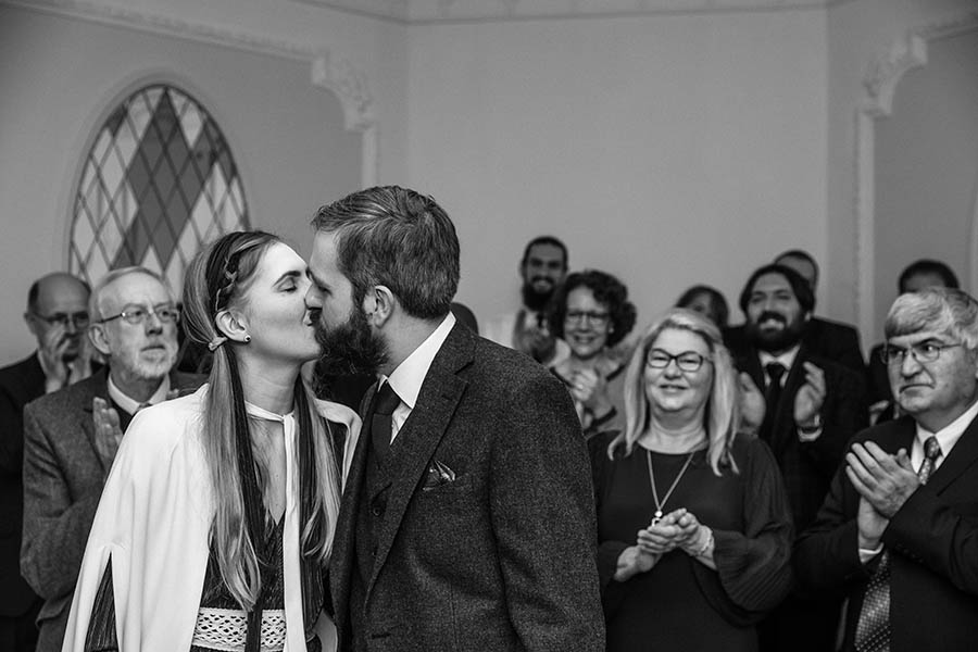 Berlin Kopenick Wedding - Bride and groom first kiss chapel wedding