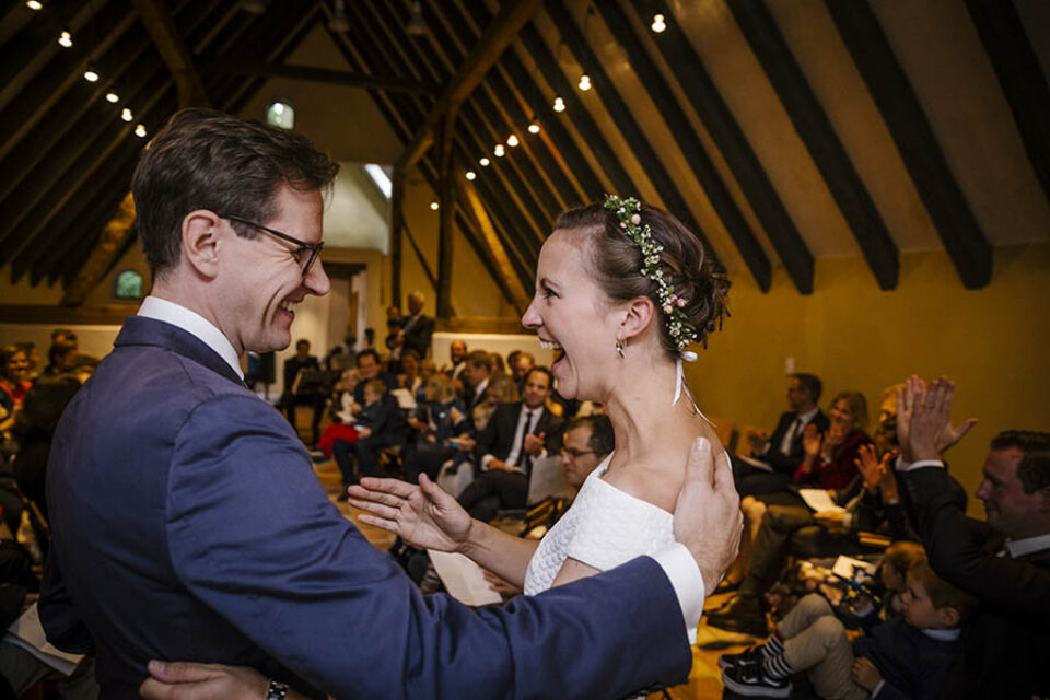 Newlyweds after first kiss