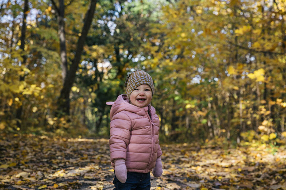 Happy toddler in autumn