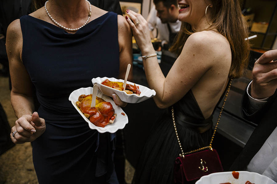 Woman with pearls and currywurst