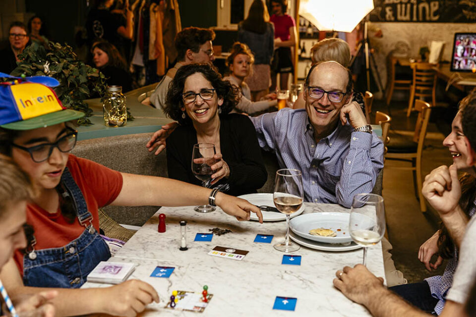 Laughing guests at bat mitzvah